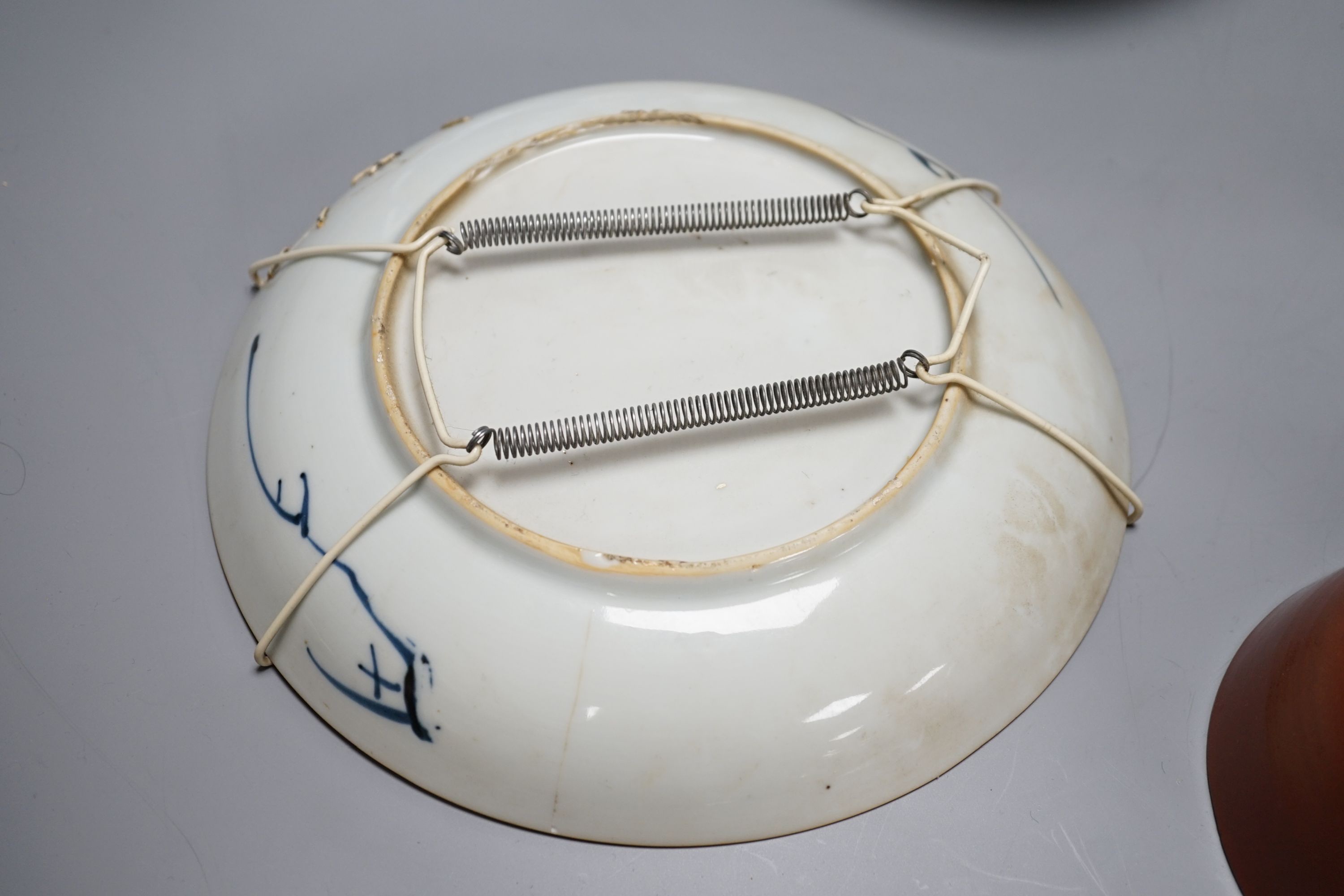 A 19th century blue and white dish, 22cm, together with three others